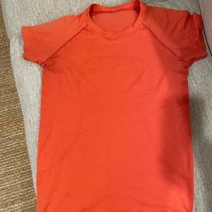Lululemon swiftly tech 2.0 tight fit shirt in burnt orange size 6